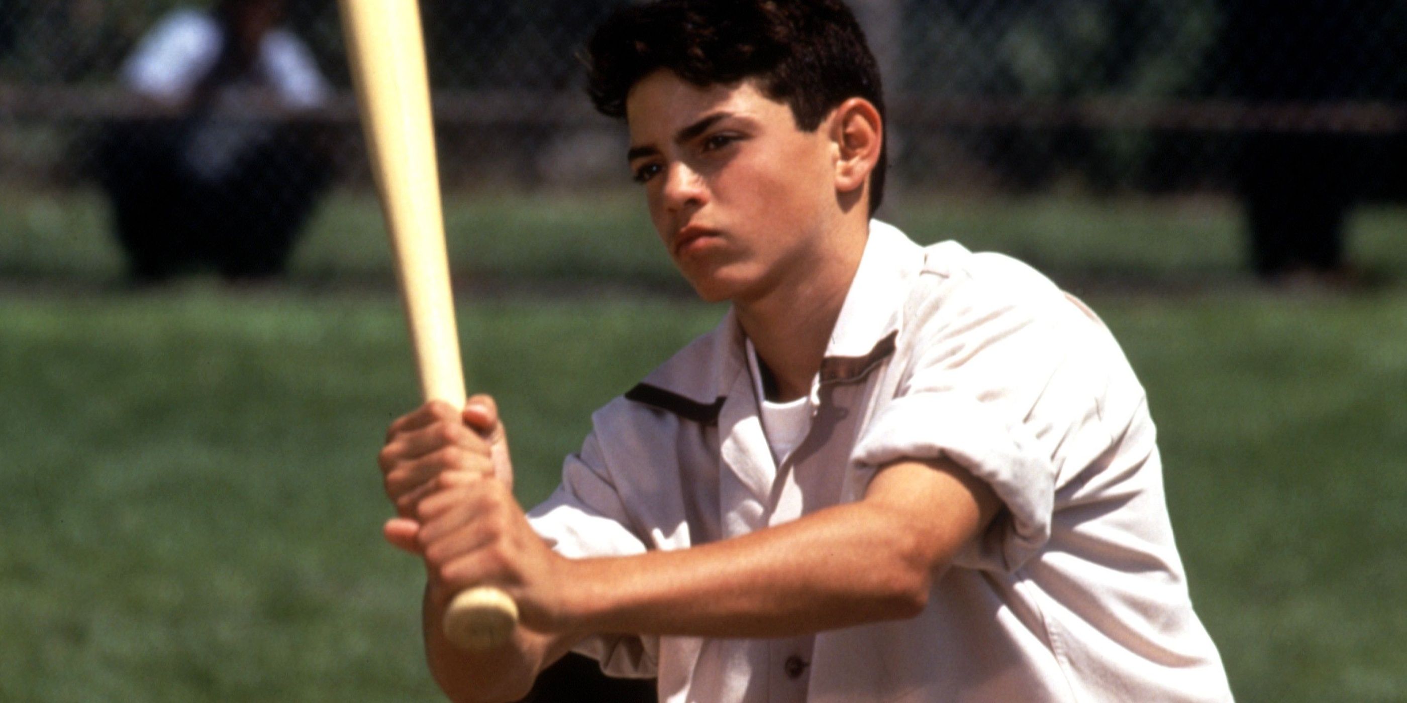 A kid holding a baseball bat in The Sandlot