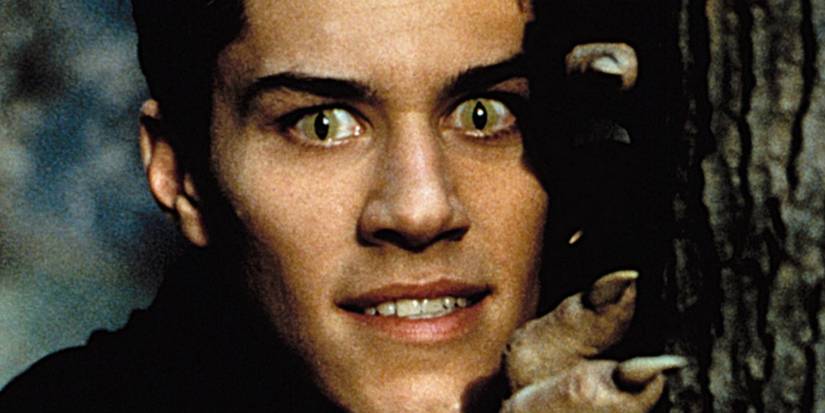 Tommy Dawkins (Brandon Quinn) smiling as he turns into a werewolf in Big Wolf on Campus.