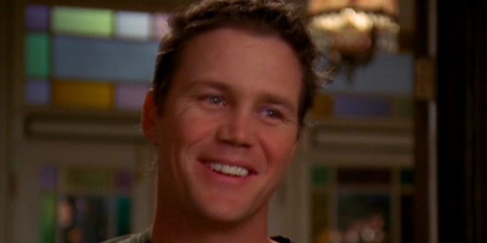 An image of Leo smiling in Charmed