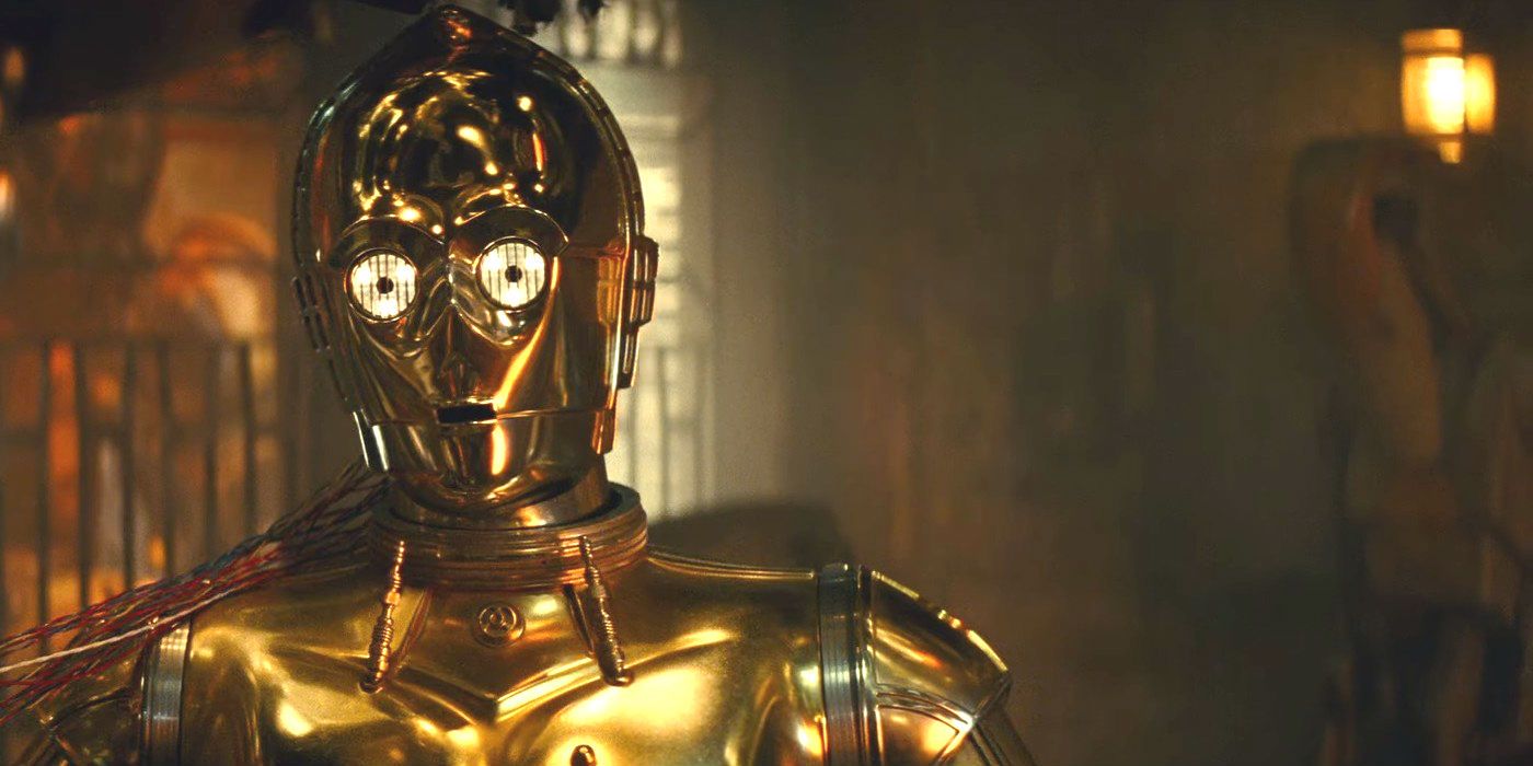 A battle droid body behind C-3PO in Star Wars The Rise of Skywalker