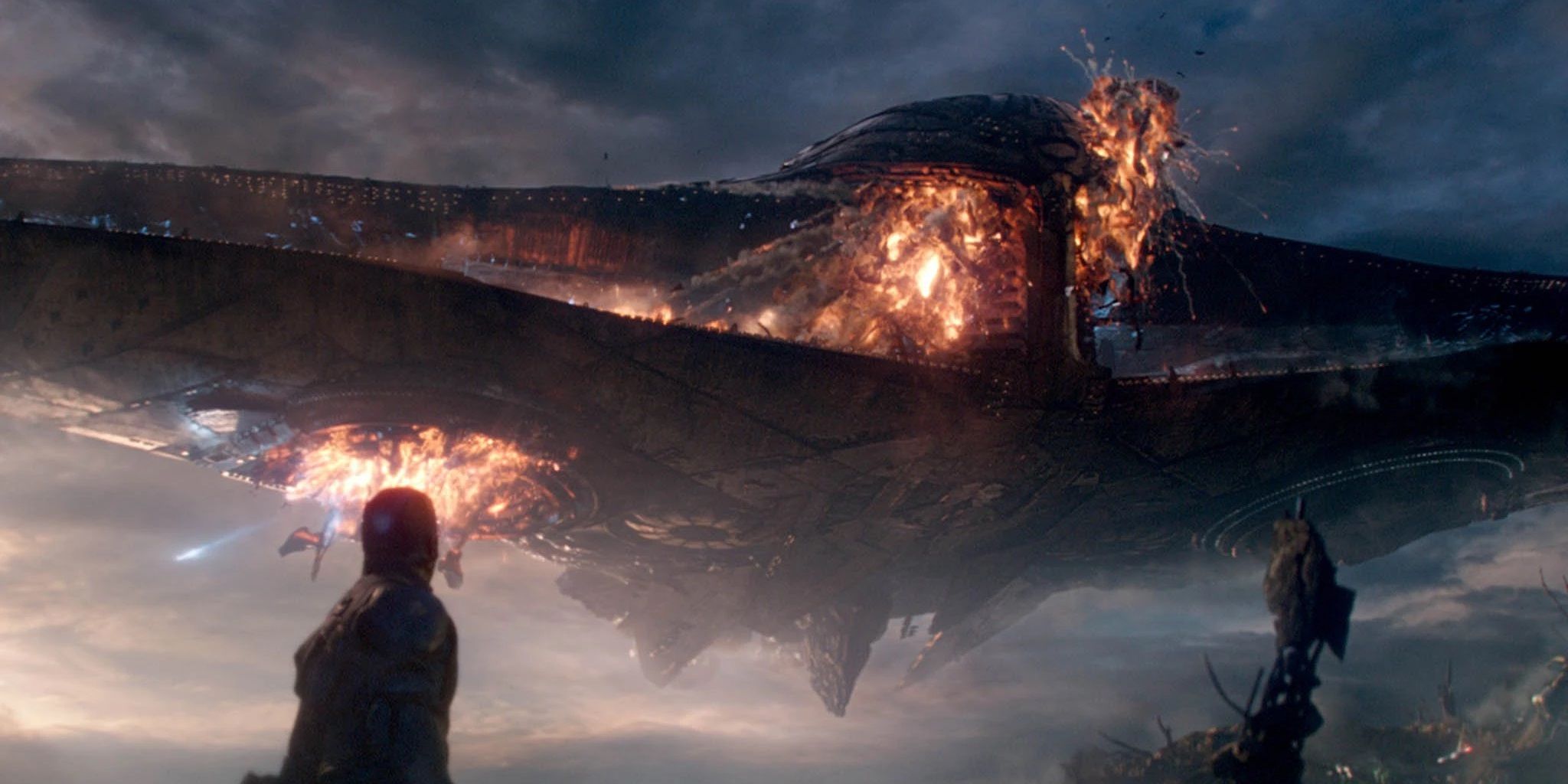 After Captain Marvel flies through, a spaceship burns, in Avengers: Endgame