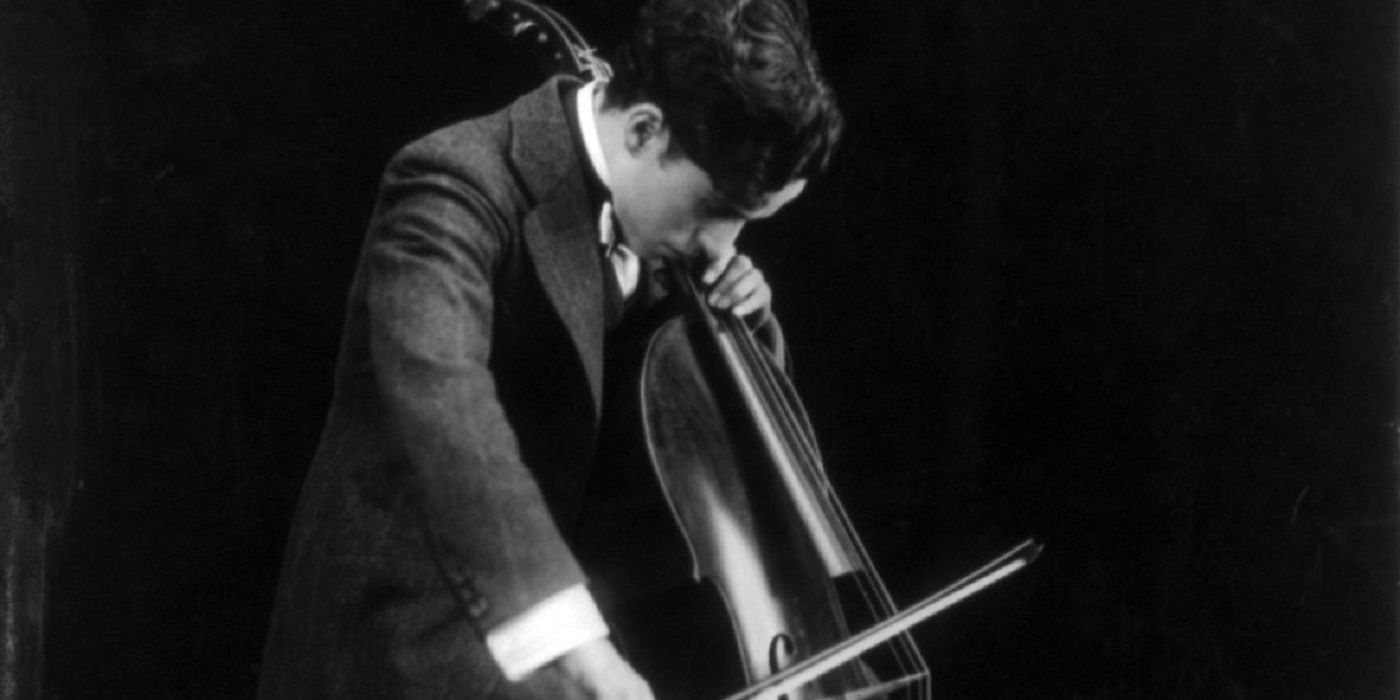 Charlie Chaplin Playing The Cello