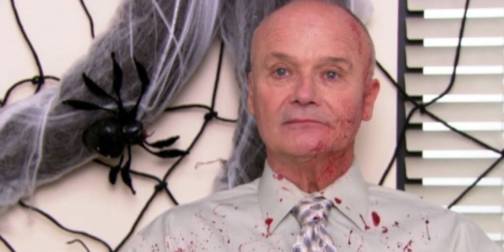 Creed Baton on Halloween with blood on his shirt on The Office