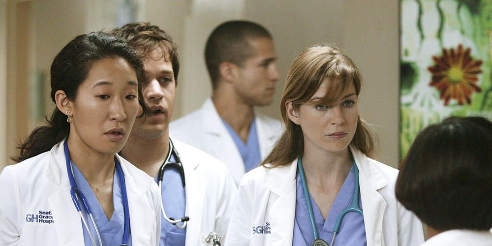 Cristina and Meredith with George in the background talking to Bailey on Grey's Anatomy