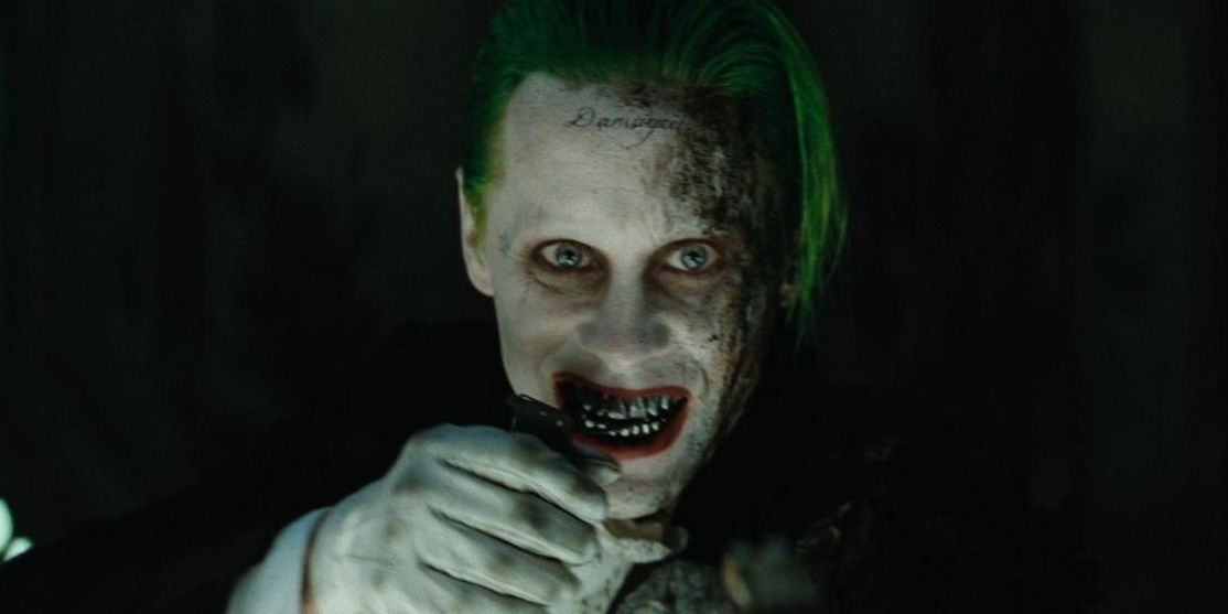 The Joker grins in the dark in a deleted scene from The Suicide Squad