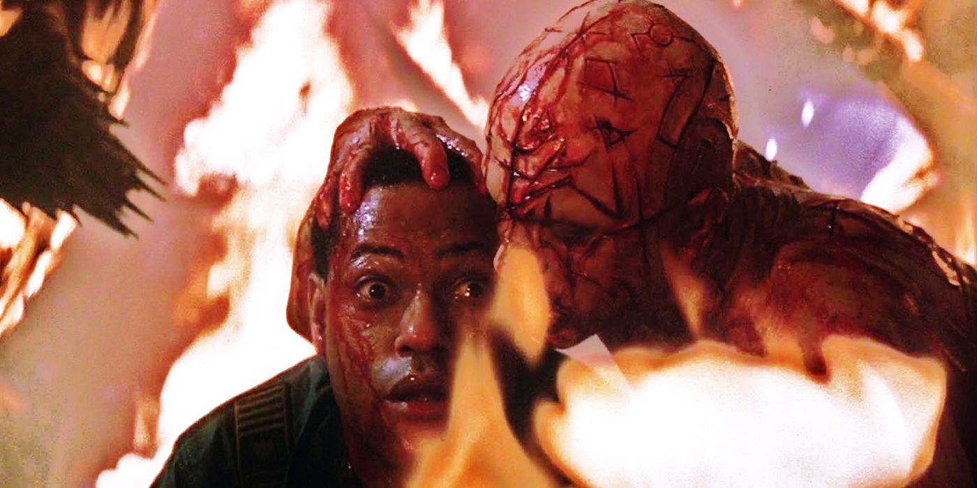 Captain Miller (Laurence Fishburne) being killed by Doctor Weir (Sam Neill) amidst flames