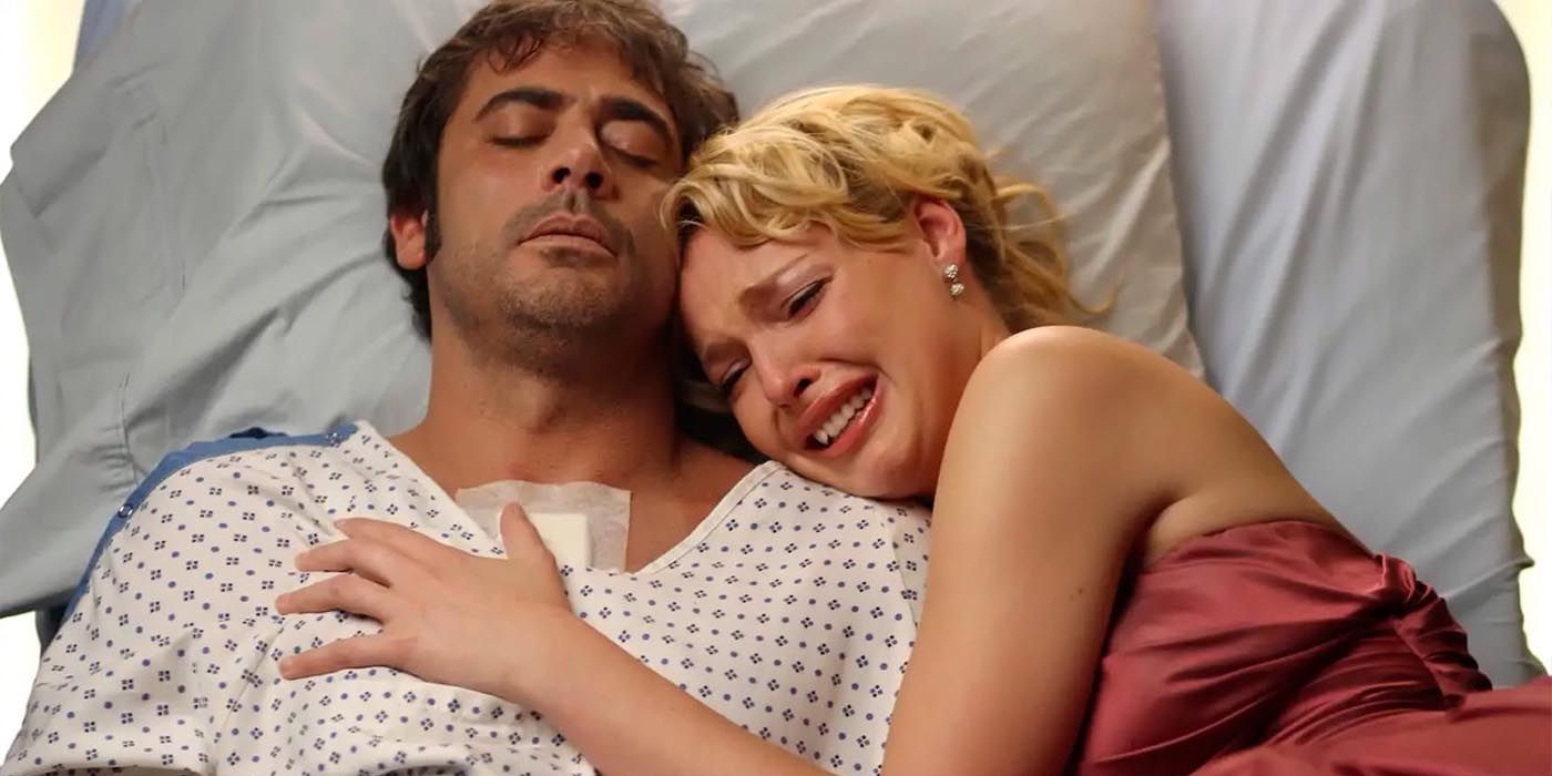 Izzie cries while hugging Denny's body in Grey's Anatomy