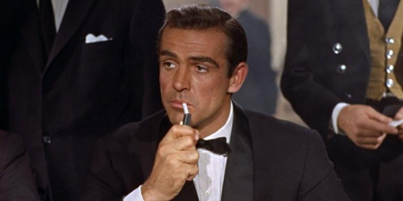 James Bond lights a cigarette in Dr No