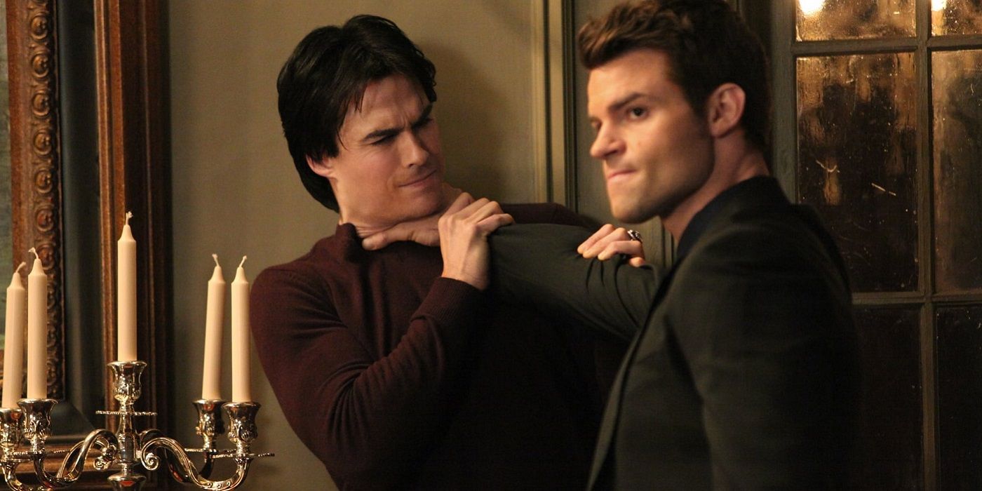 Elijah choking Damon on The Vampire Diaries