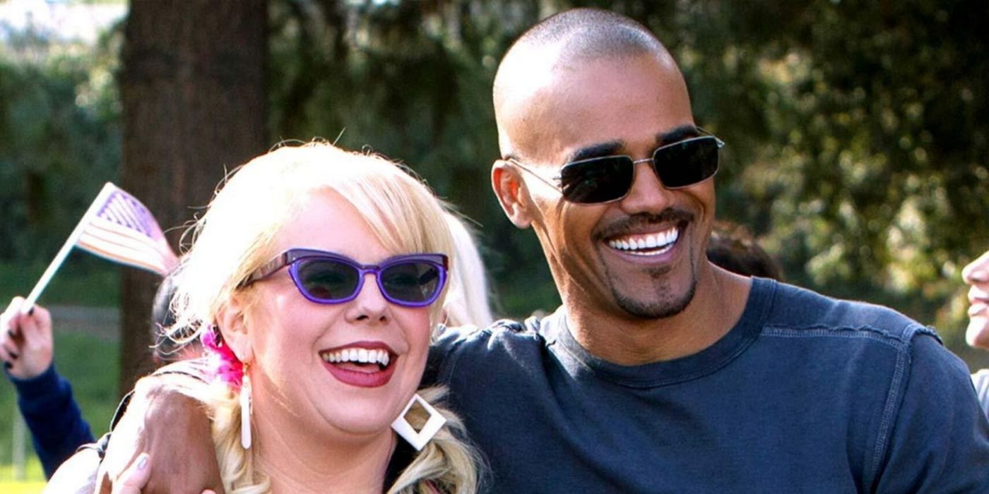 Morgan and Garcia embracing, smiling, wearing sunglasses
