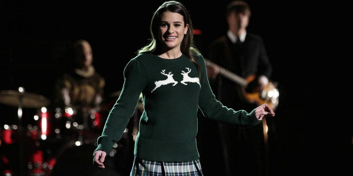 Rachel in a reindeer sweater singing in Glee