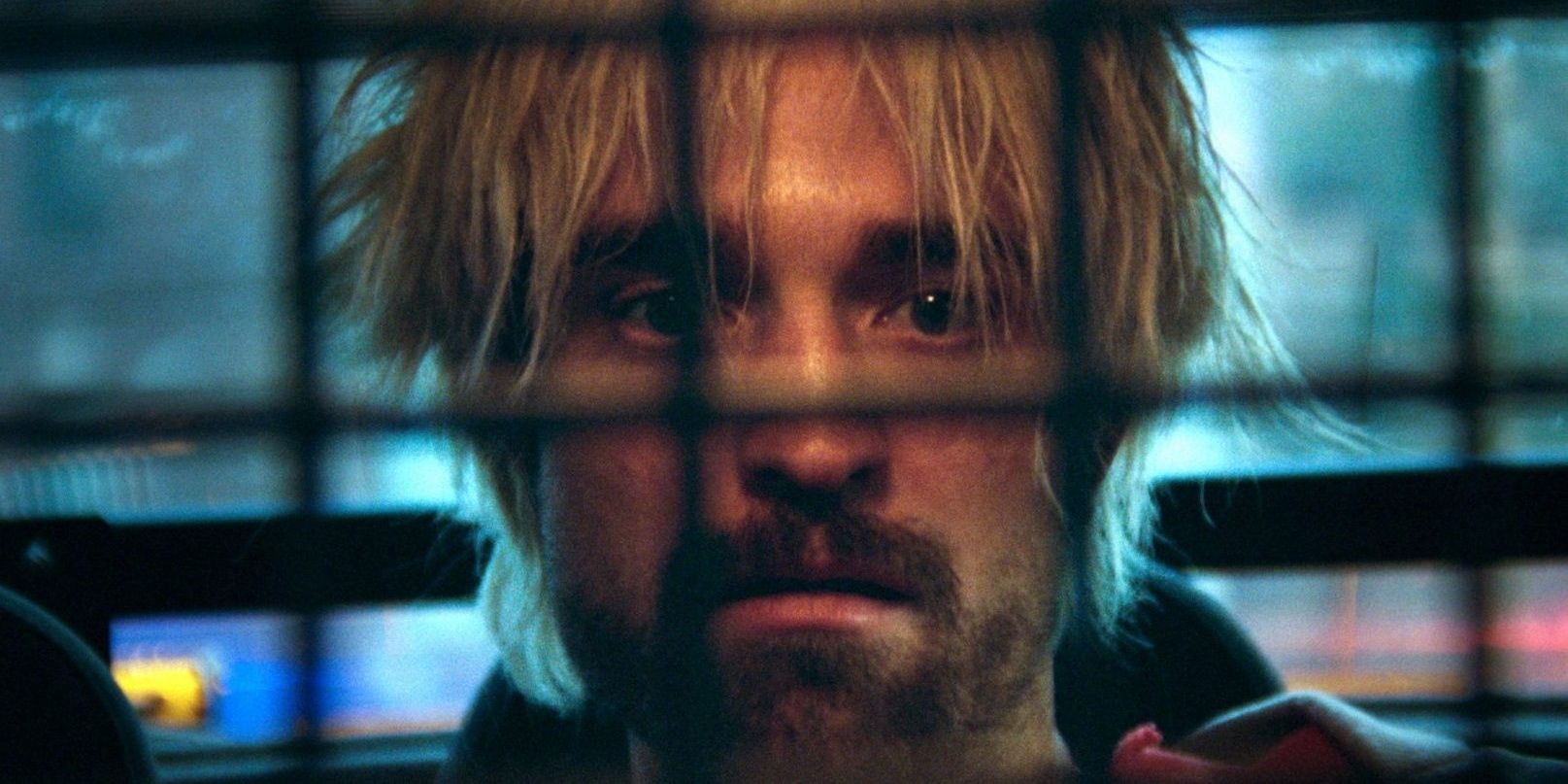 Robert Pattinson behind bars in Good Time 