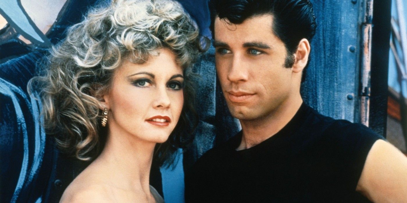 Sandy and Danny outside the funhouse at the carnival in Grease