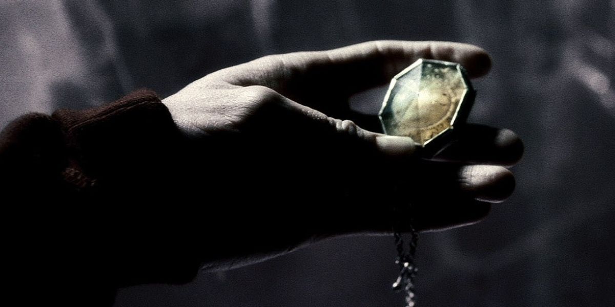 The locket Horcrux in Harry's hand in Harry Potter. 