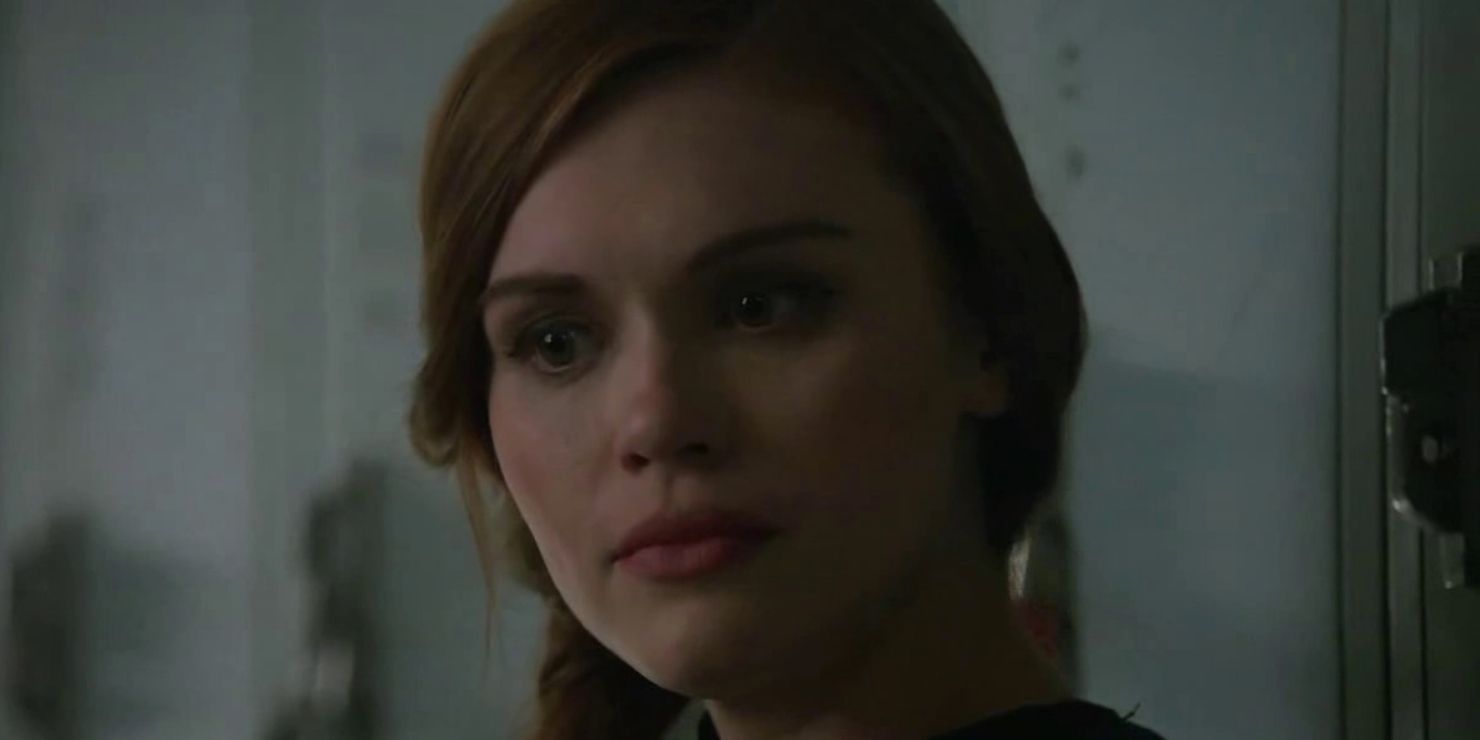 Lydia waits for Stiles in the hallway in Teen Wolf.