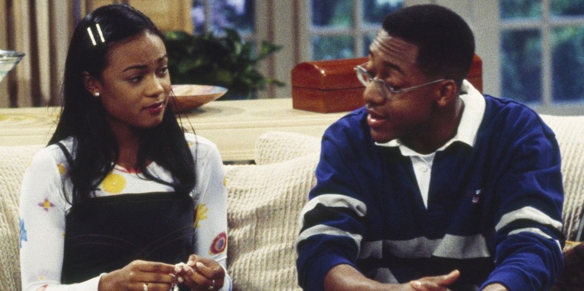 Jaleel White with Tatyana Ali on the couch as love interests on The Fresh Prince of Bel-Air