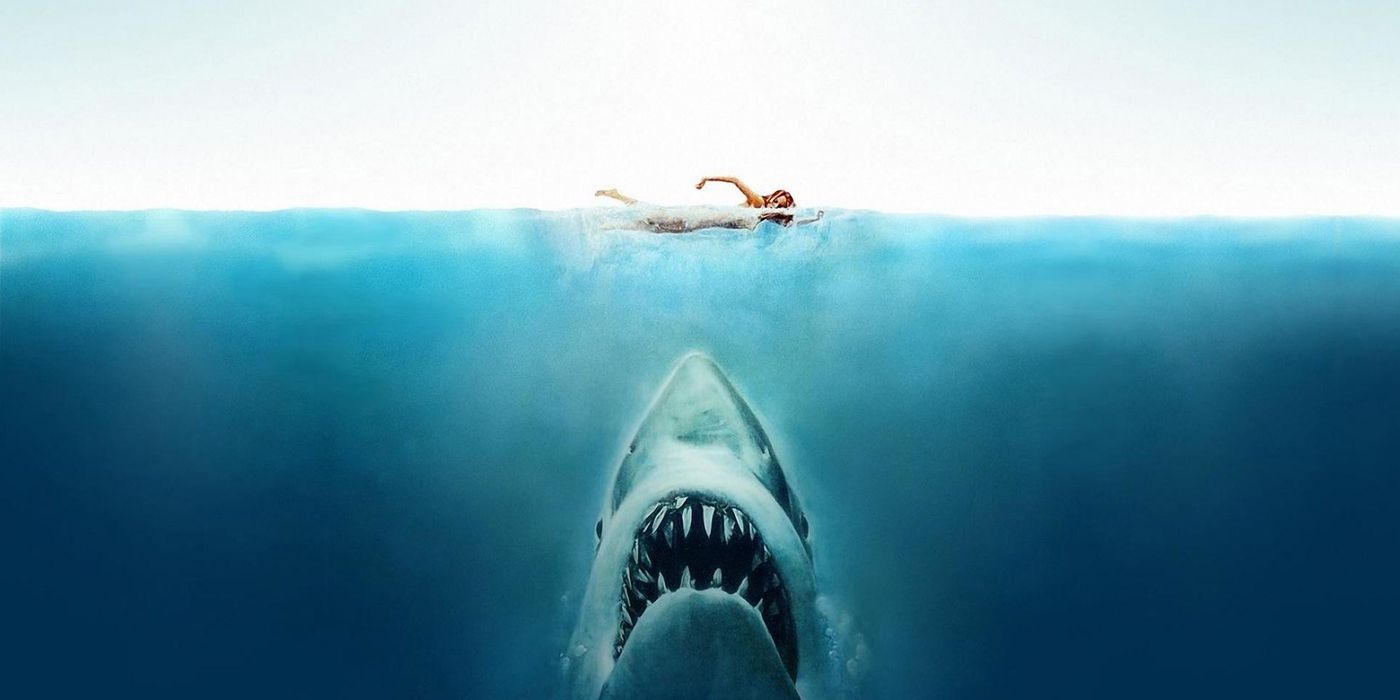 Jaws poster of a big shark going up to eat a swimmer