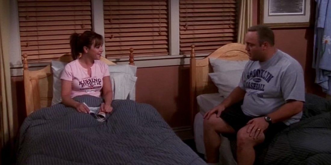 Doug and Carrie talking in bed together on King of Queens.