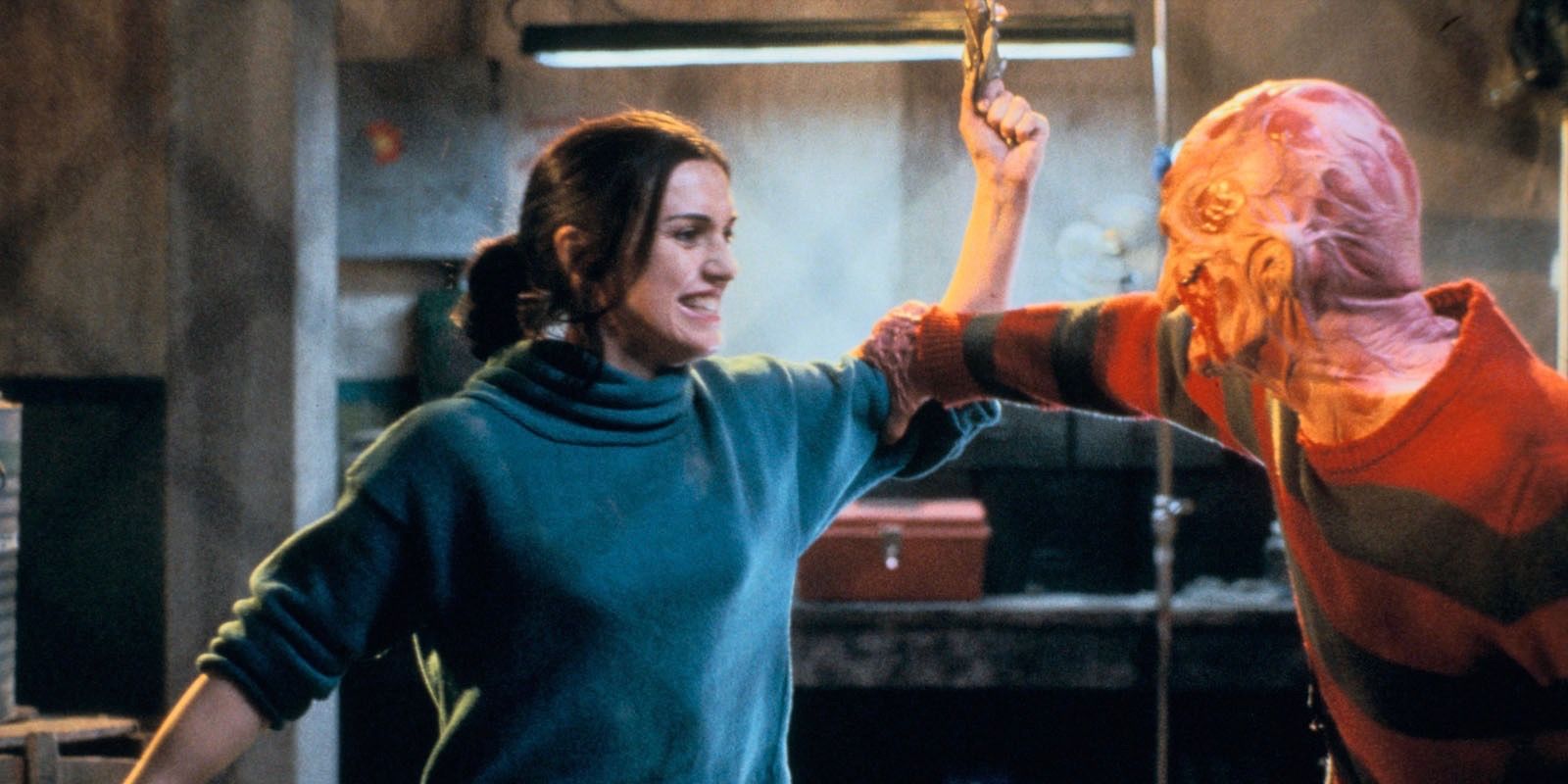 Lisa Zane as Maggie and Robert Englund as Freddy Krueger in A Nightmare on Elm Street