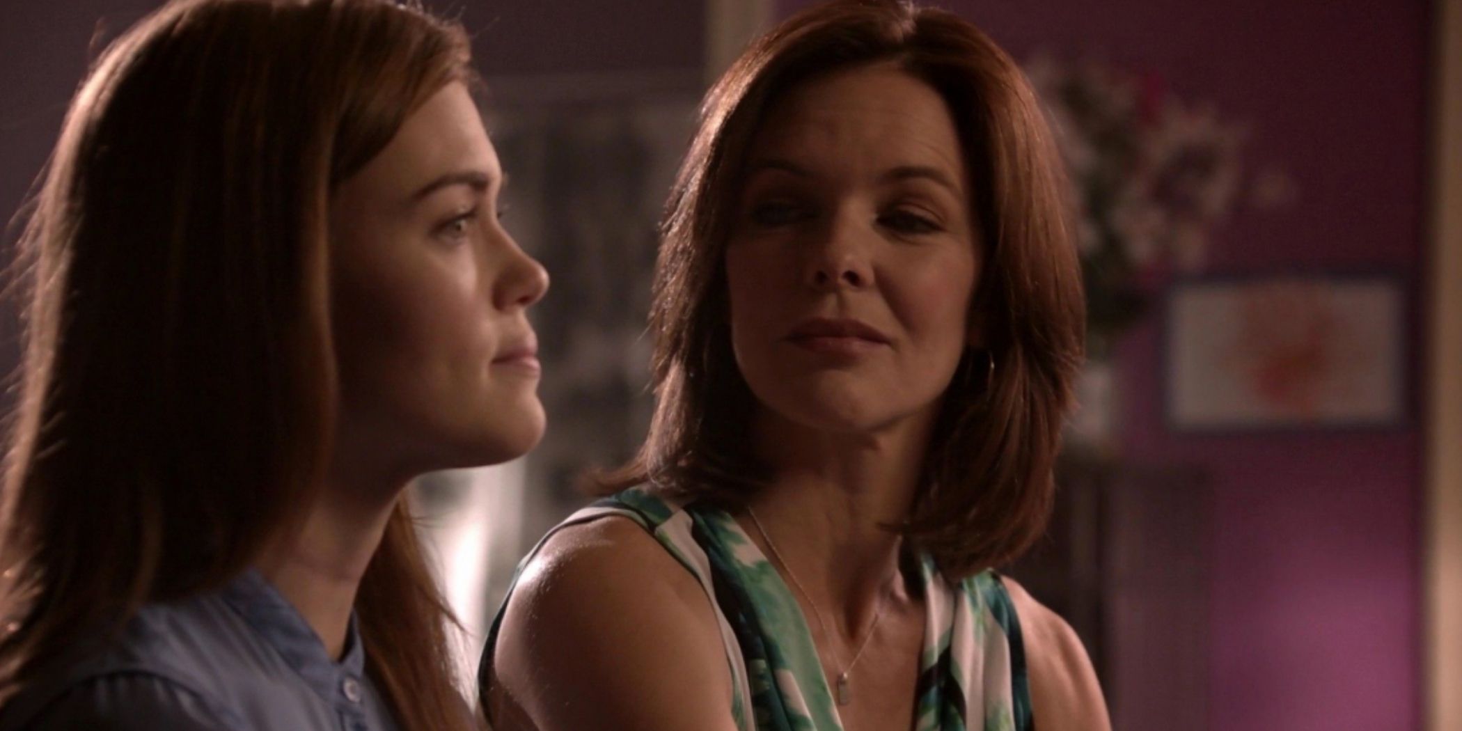 Lydia sits with her mother after deciding not to cover up her bruises in Teen Wolf