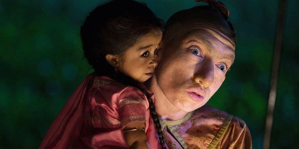 A man holding Ma Petite in American Horror Stories: Freak Show