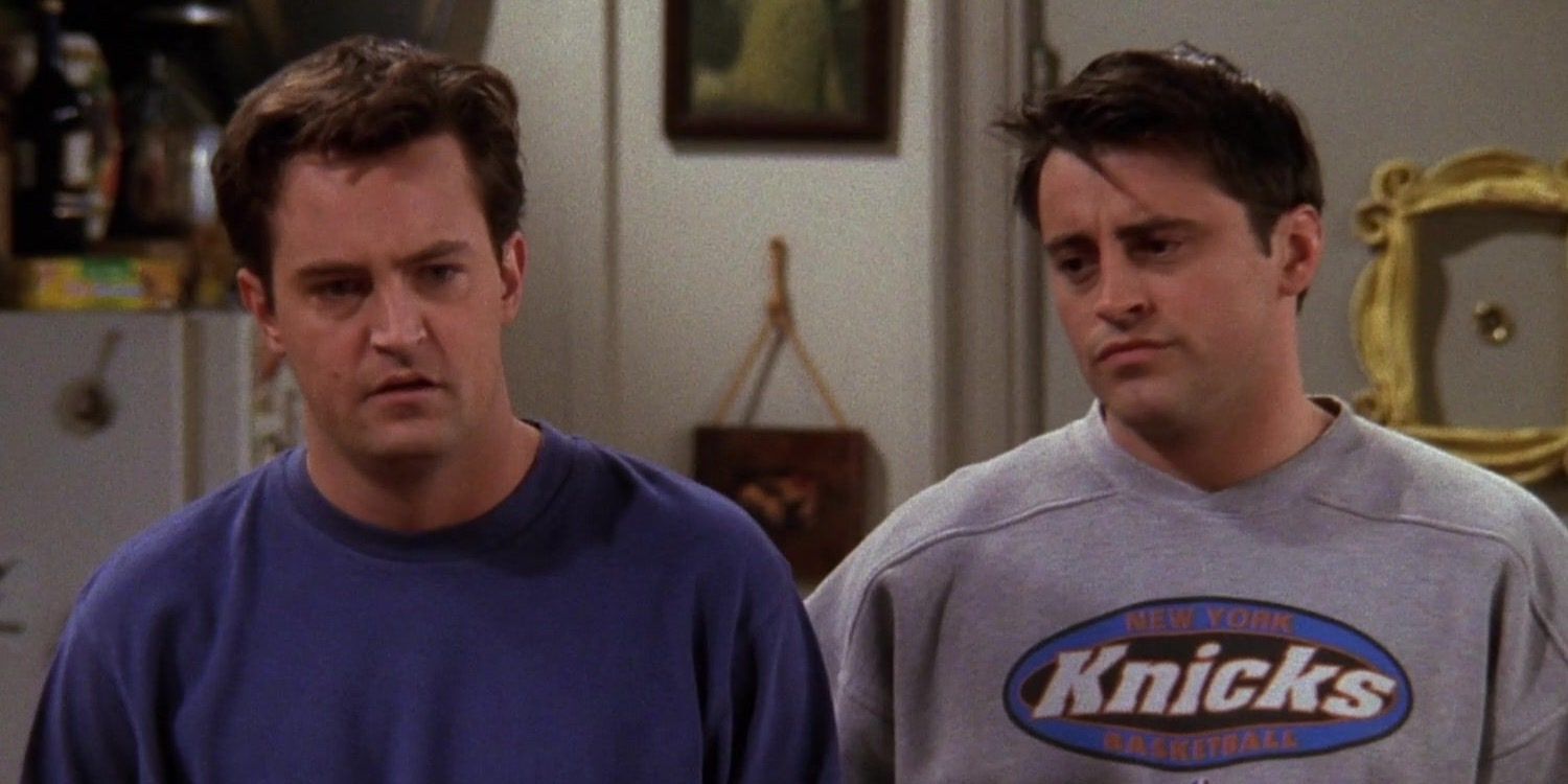 Joey and Chandler standing in their apartment in Friends