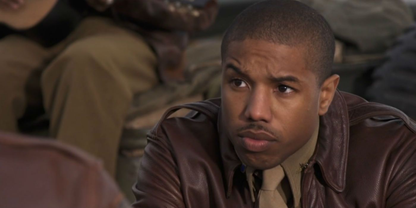 Michael B. Jordan as Maurice Wilson sitting among the other pilots in Red Tails.