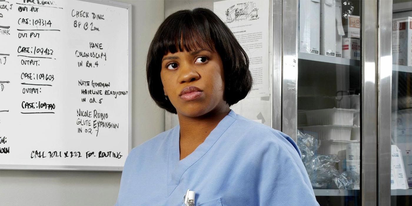 Miranda Bailey stands in front of a white board in Grey's Anatomy