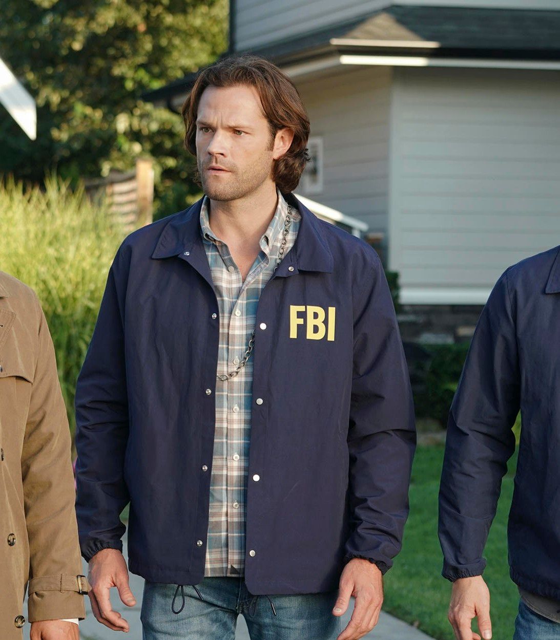 Misha Collins as Castiel, Jared Padakecki as Sam Winchester and Jensen Ackles as Dean in Supernatural vertical