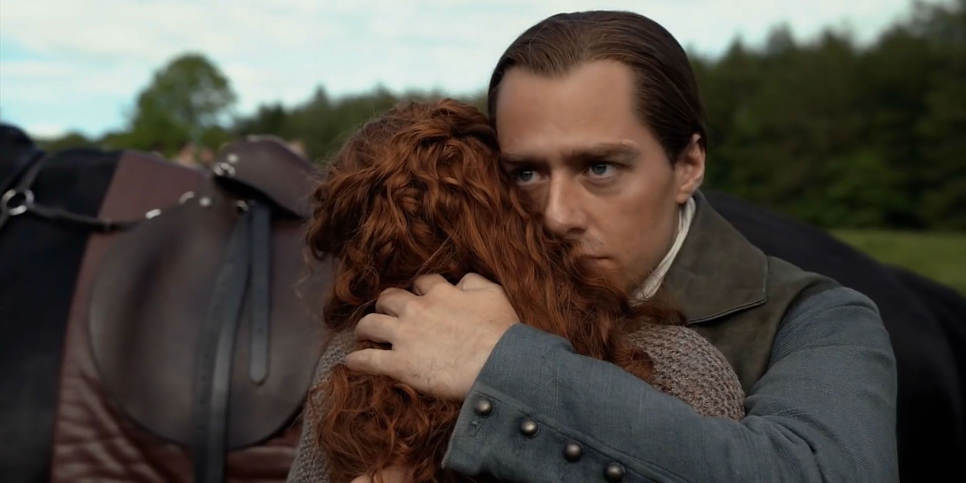 Two characters hugging in Outlander season 5