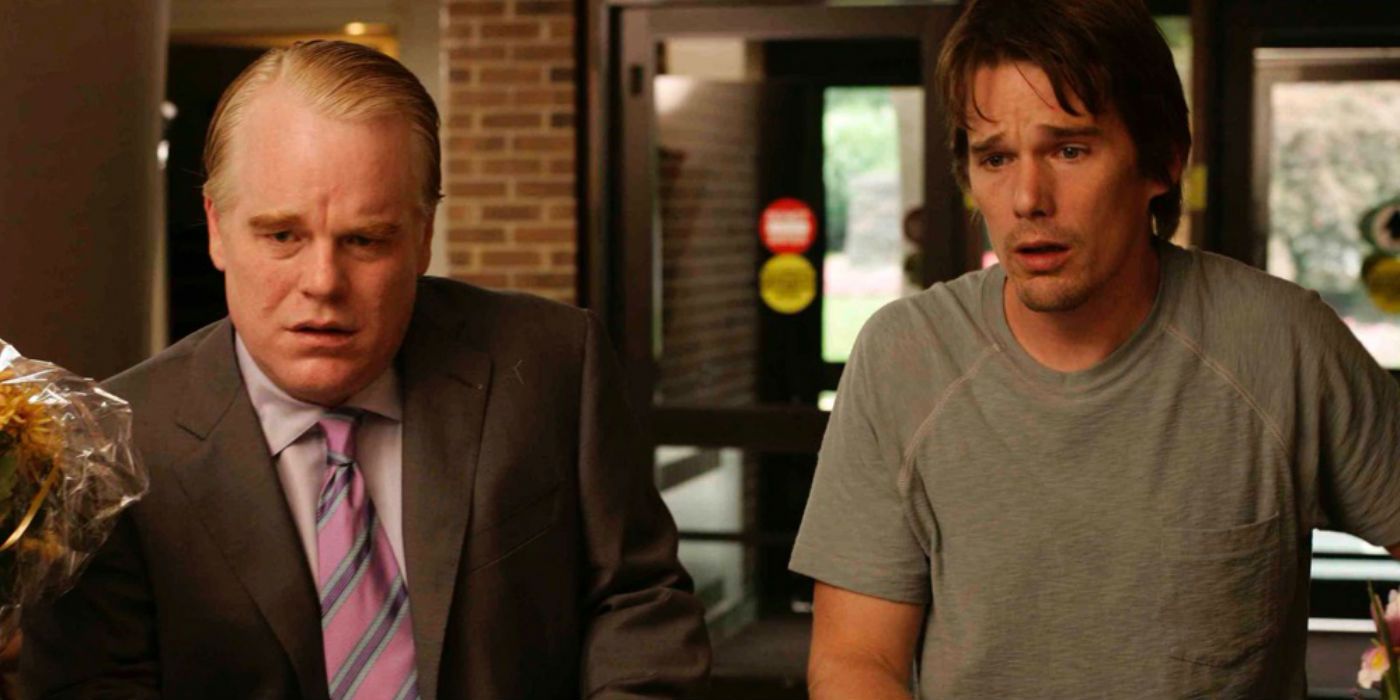 Phillip Seymour Hoffman and Ethan Hawke looking distraught in Before the Devil Knows You're Dead