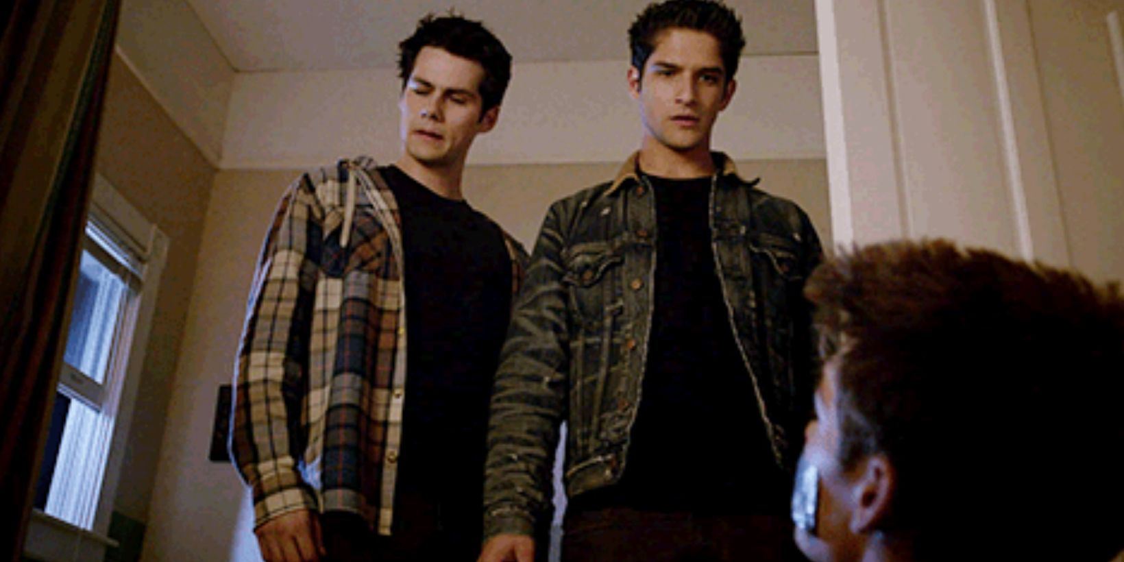 Stiles and Scott stand over a kidnapped Liam in Teen Wolf