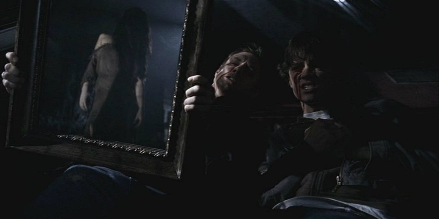 Dean holds a mirror up to the Bloody Mary in Supernatural