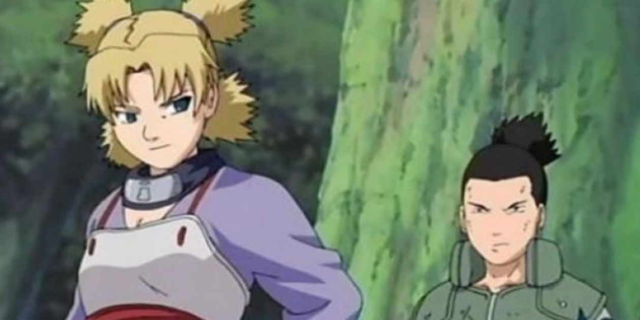 Temari stands in front of Shikamaru, saving him from a threat during the Sasuke Recovery Mission in Naruto