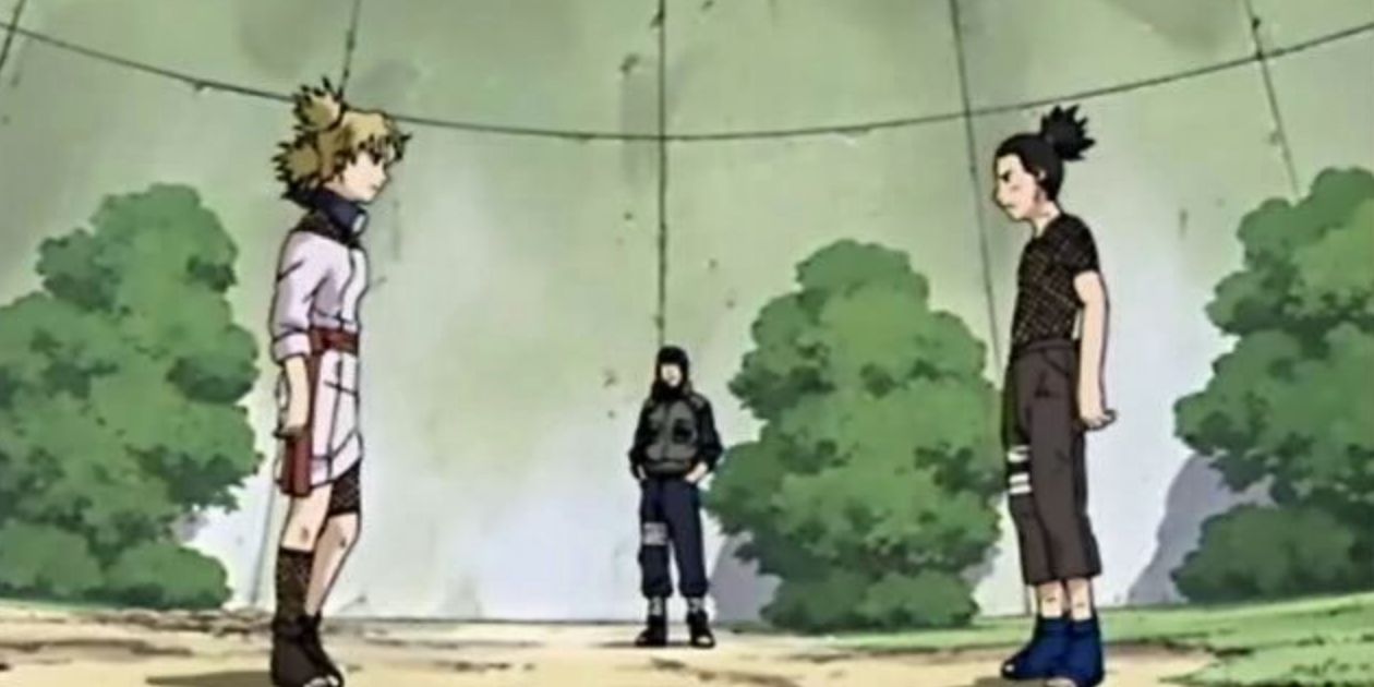 Temari and Shikamaru stand on either side of the arena for their Chunin Exam match up in Naruto