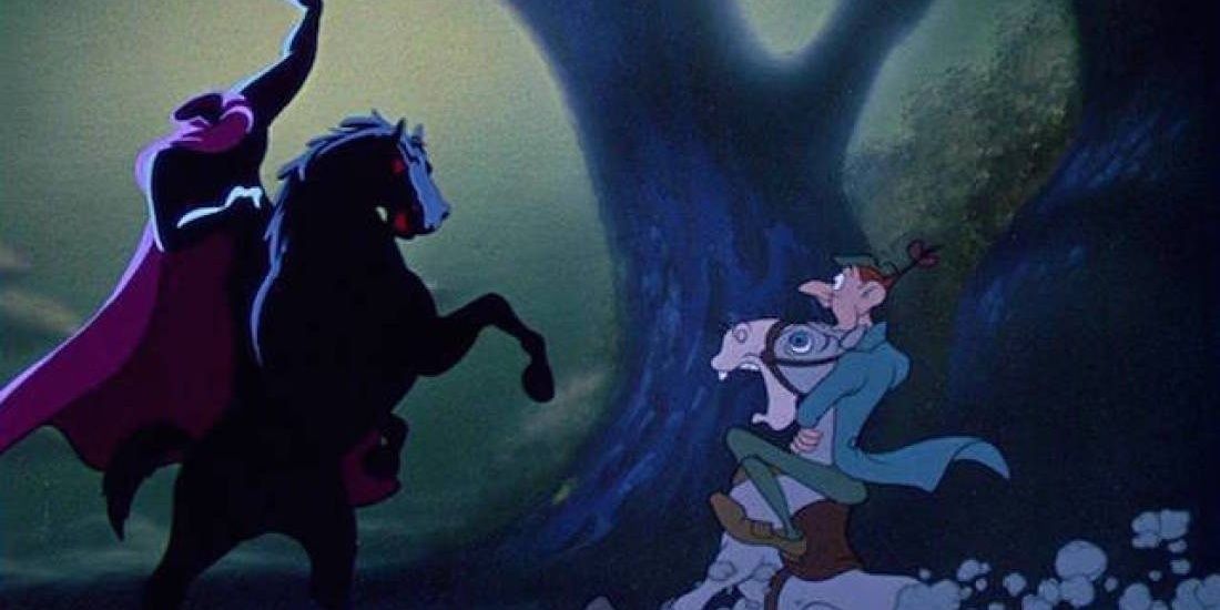 The Headless Horseman rearing up on his horse and scaring Ichabod Crane and his horse in Sleepy Hollow.