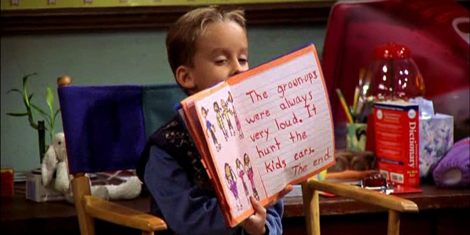 Michael shows off a book in Everybody Loves Raymond