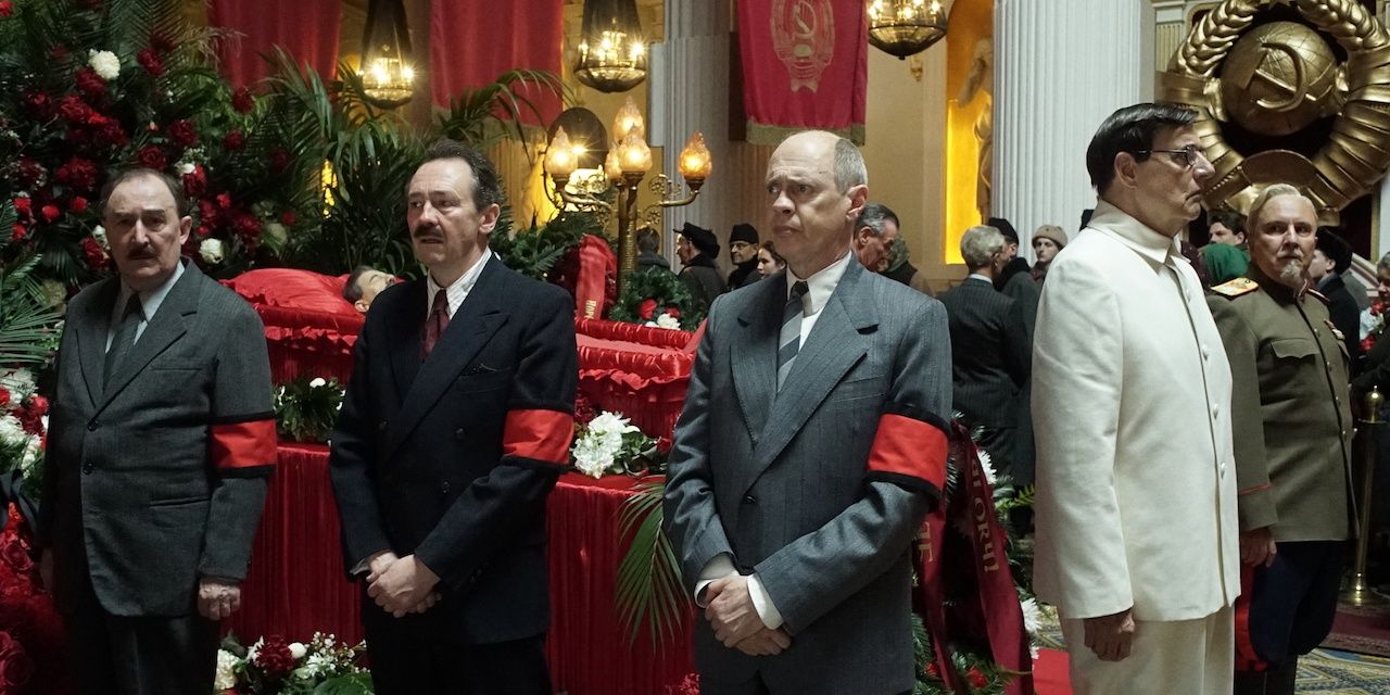Stalin's comrades circling the casket in The Death of Stalin