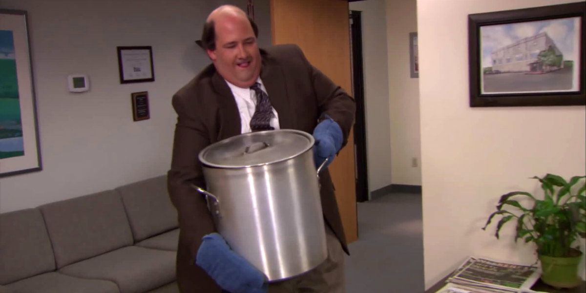 Kevin carries his homemade curry in to the office in The Office