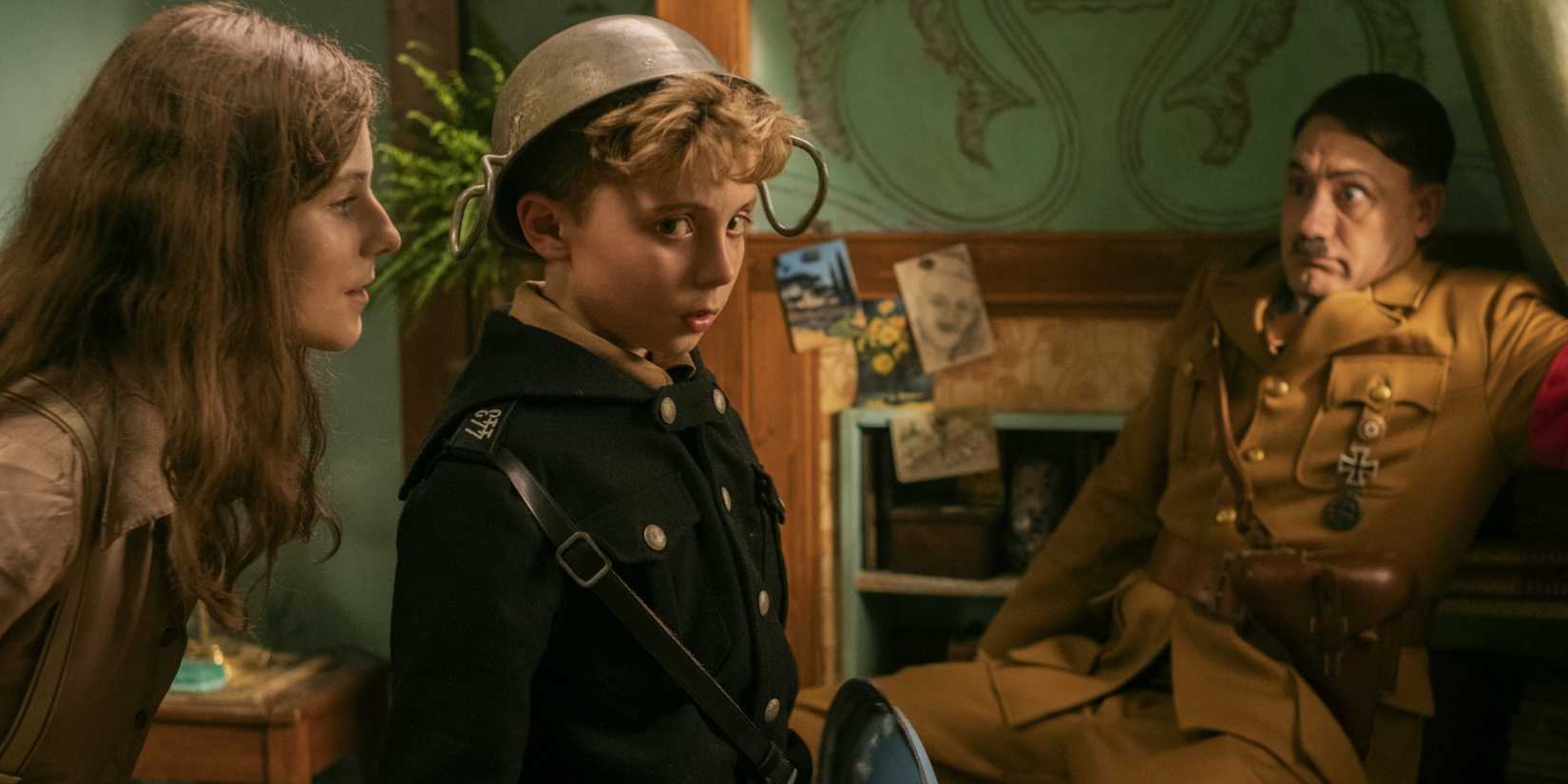Thomasin McKenzie, Roman Griffin Davis, and Taika Waititi in Jojo Rabbit