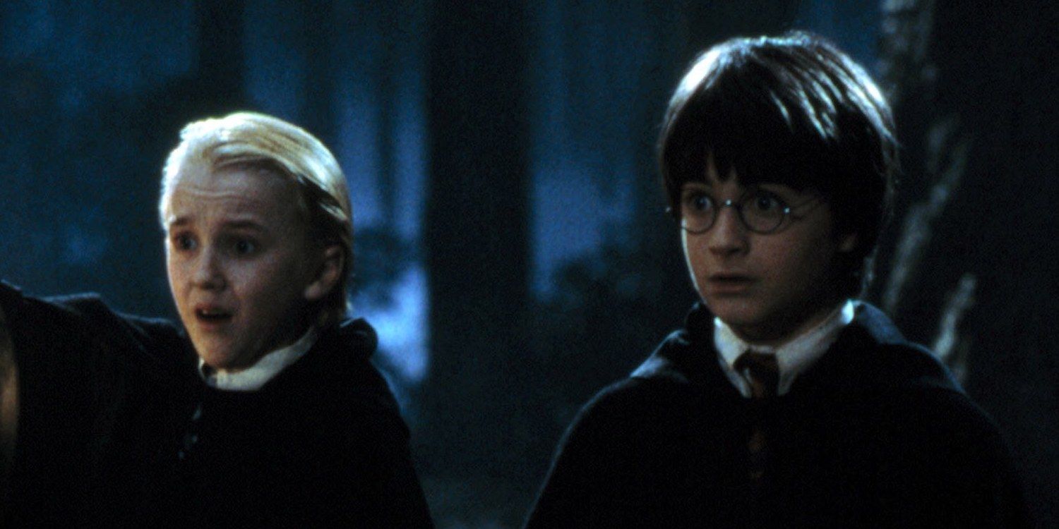 Tom Felton as Draco and Daniel Radcliffe as Harry