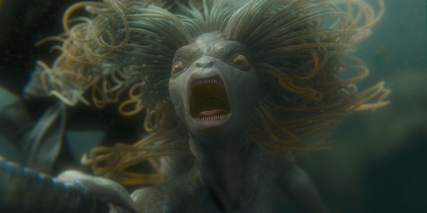 One of the merpeople bares its teeth in Harry Potter