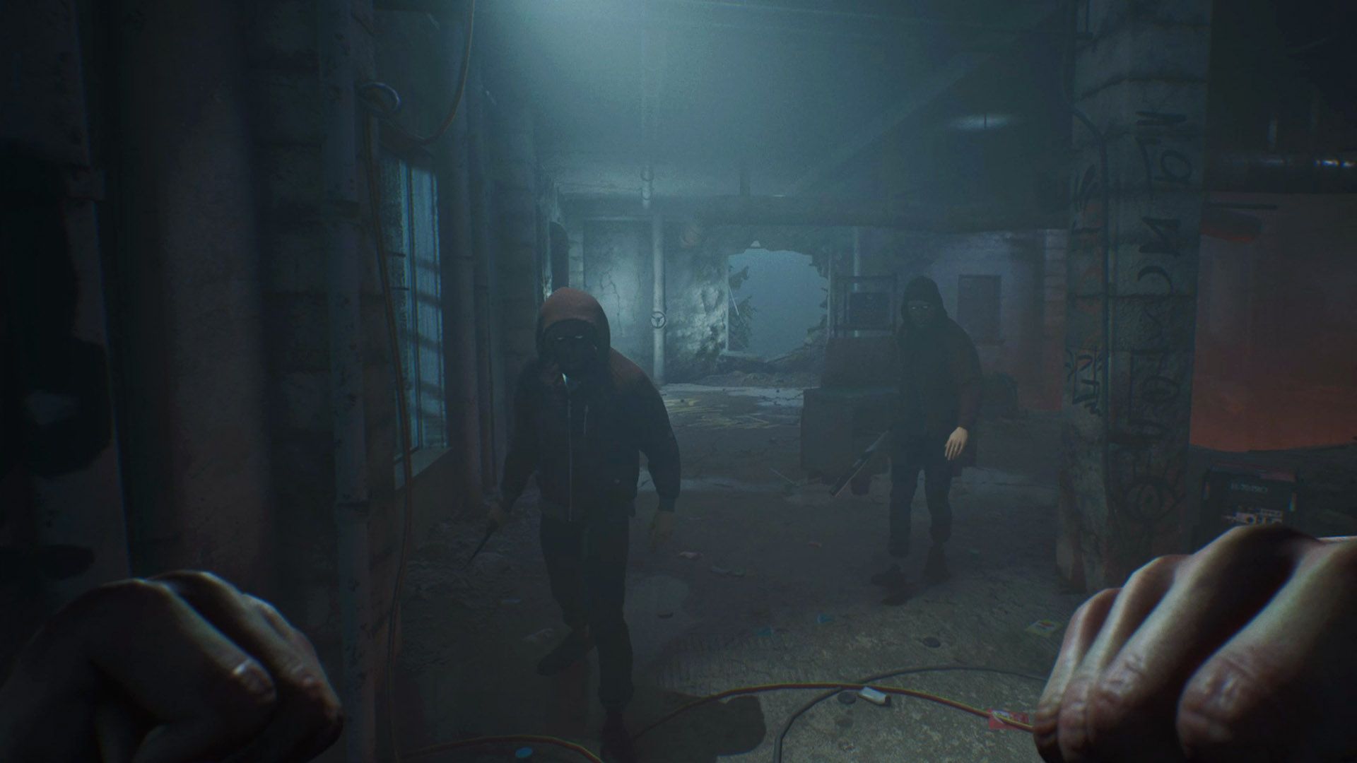 A screenshot of gameplay in Vampire The Masquerade - Bloodlines 2 featuring the first-person perspective of a character raising their fists as two hooded figures approach them.