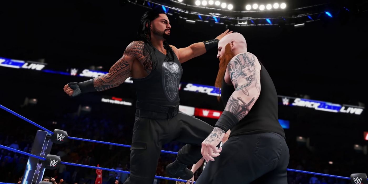A wrestler punches another wrestler in the ring from WWE 2K20