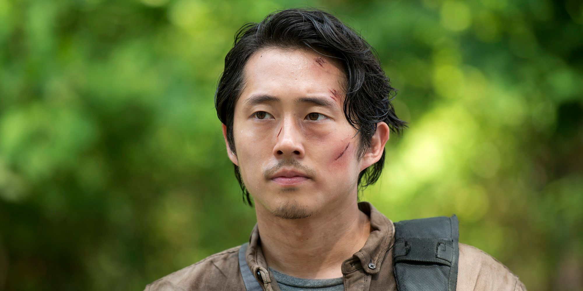 Glenn de Steven Yeun em The Walking Dead