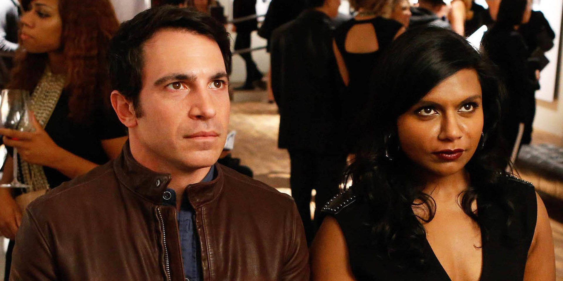 Danny and Mindy looking off camera on The Mindy Project