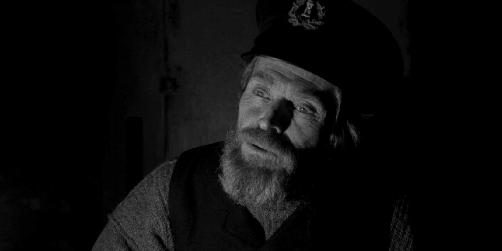 Willem Dafoe looking mischevious in The Lighthouse