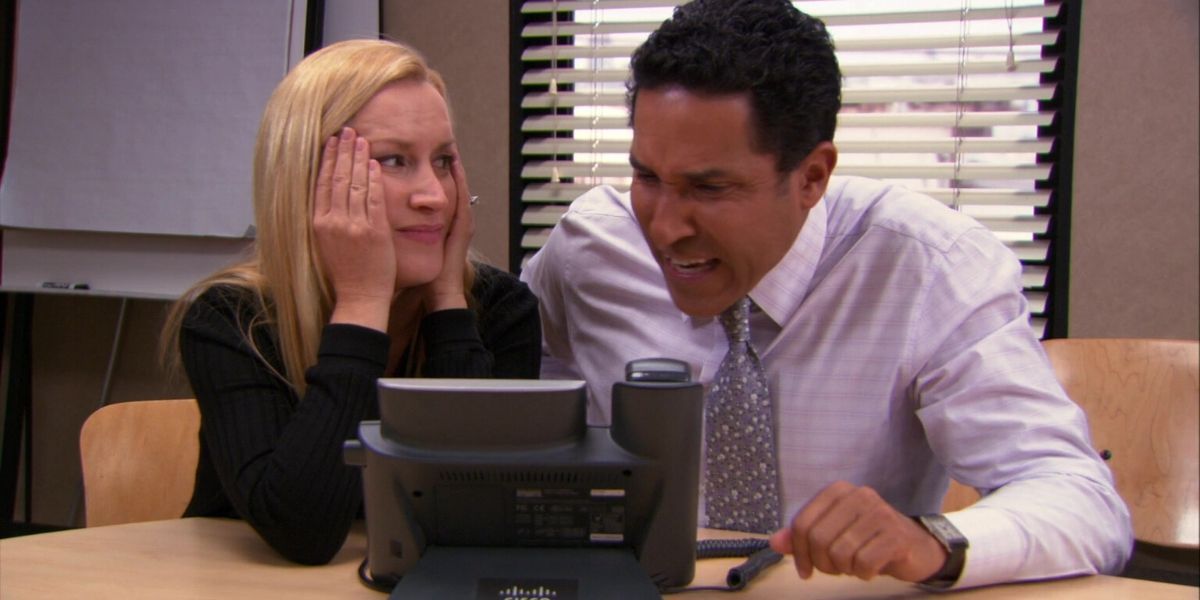 Angela and Oscar on the phone on The Office