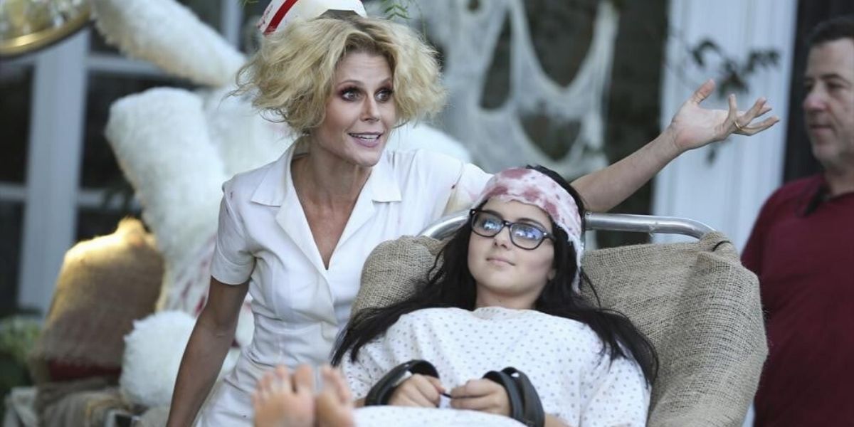 Claire rolling Alex out on a stretcher on Halloween on Modern Family