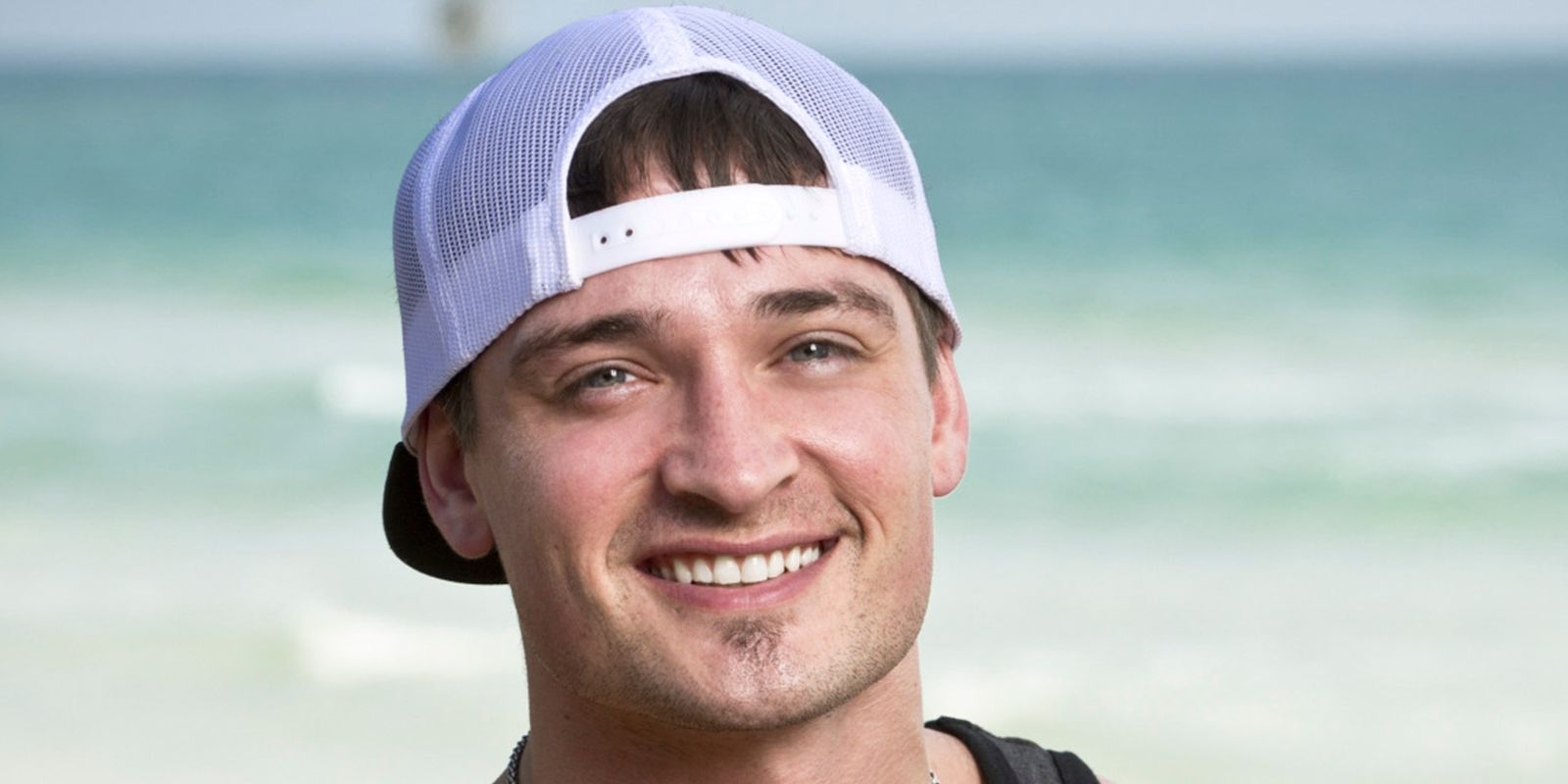 Caleb wearing a backwards hat on Survivor